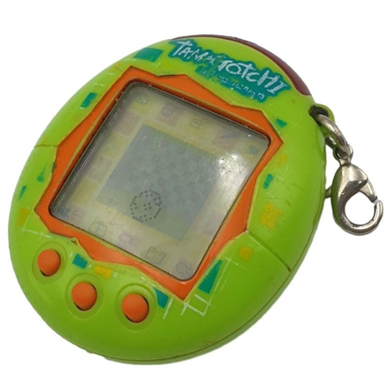 その他 Tamagochi Green & Orange Matrix Green Tamagochi Green & Orange Matrix Green | 023500590801 | Cash Converters
