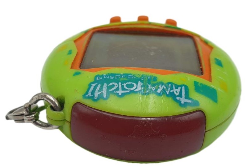 Tamagochi Green & Orange Matrix Green | 023500590801 | Cash Converters