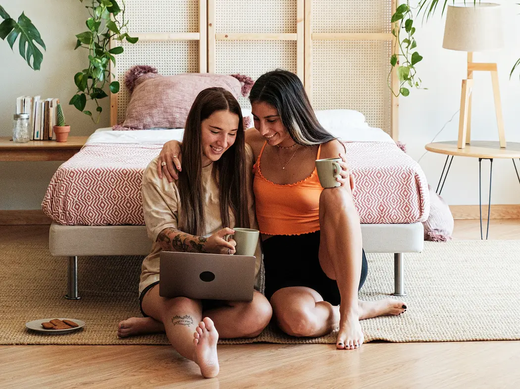 couple checking laptop