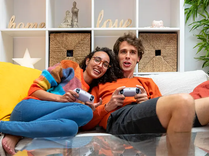Couple gaming on the couch