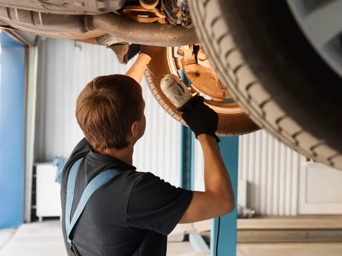 Man repairing car