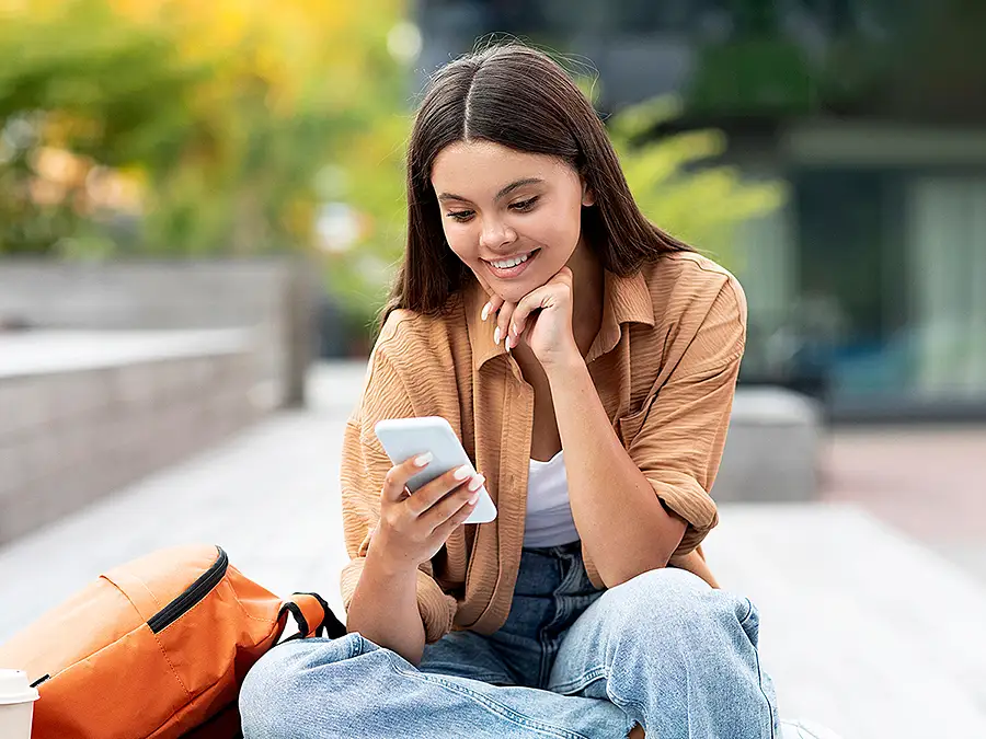 Young lady viewing phone
